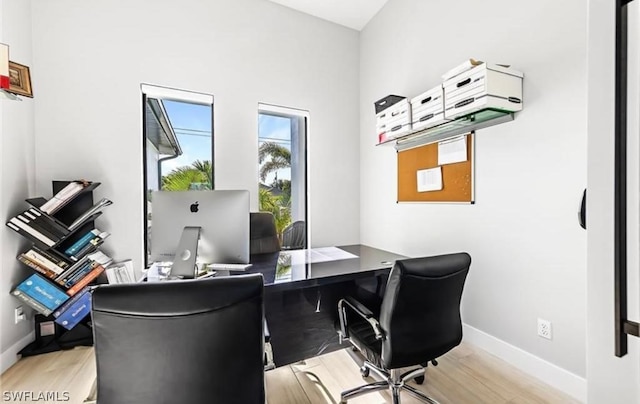 office space with hardwood / wood-style floors