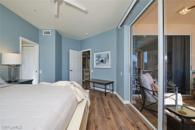 bedroom featuring hardwood / wood-style floors and ceiling fan