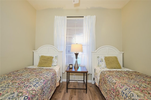 bedroom featuring wood-type flooring