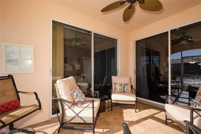 exterior space featuring ceiling fan