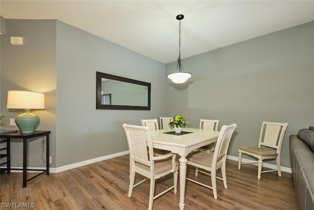 dining area featuring hardwood / wood-style floors