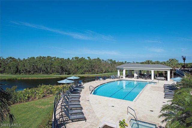 view of pool with a gazebo, a water view, and a patio area