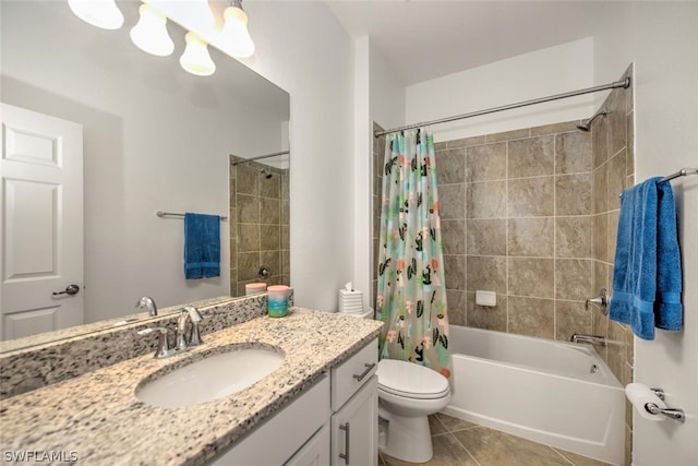 full bathroom with shower / tub combo with curtain, toilet, vanity with extensive cabinet space, and tile flooring