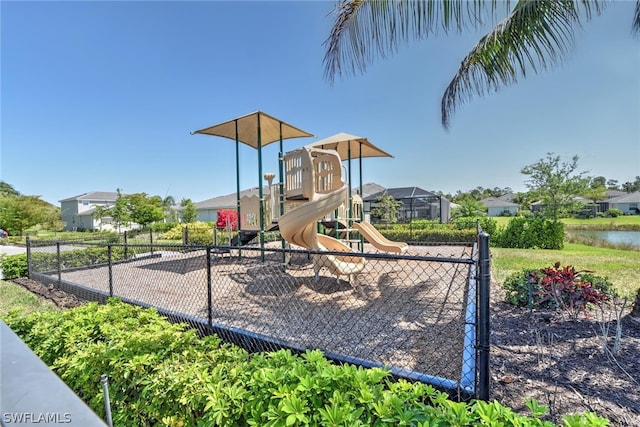 view of playground featuring a water view