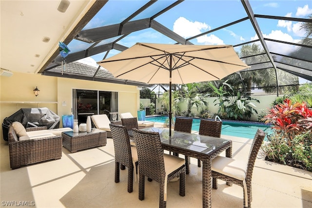 view of patio / terrace with glass enclosure