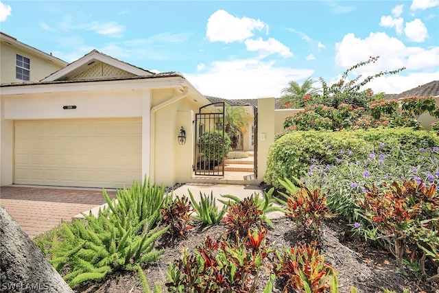 view of front of home featuring a garage