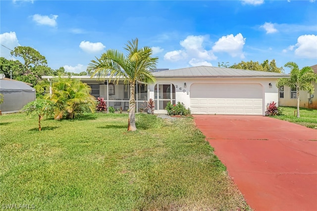 ranch-style home with a garage and a front yard