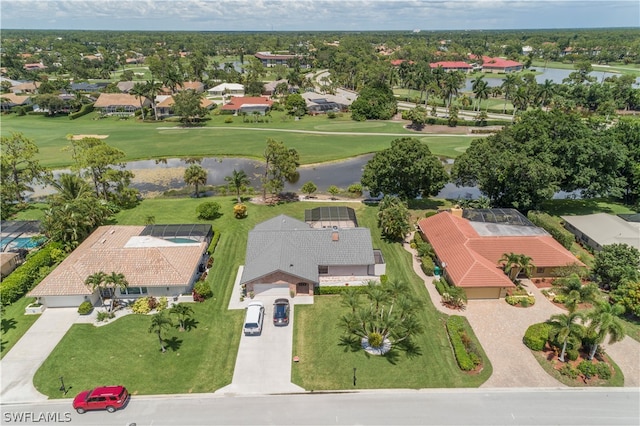 drone / aerial view with a water view