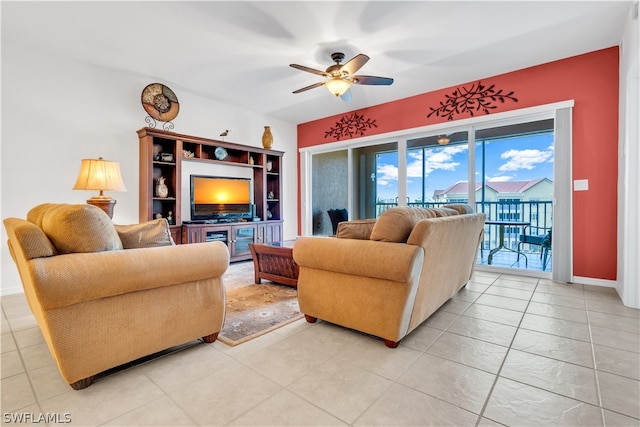 tiled living room featuring ceiling fan