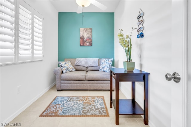 living room with ceiling fan and tile floors