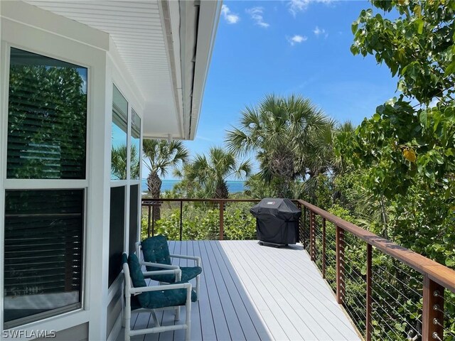 wooden deck with area for grilling