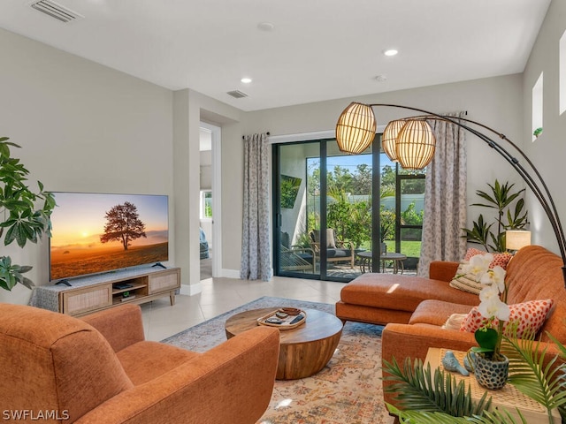 tiled living room featuring plenty of natural light