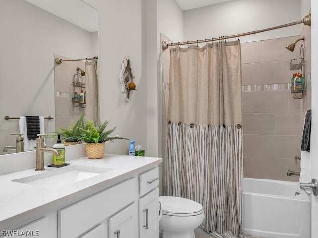 full bathroom with toilet, vanity, and shower / tub combo with curtain