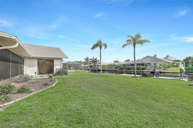 view of yard featuring a water view