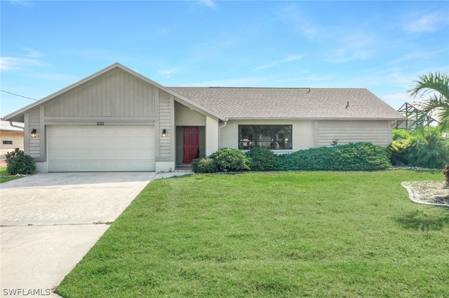 single story home featuring a garage and a front yard