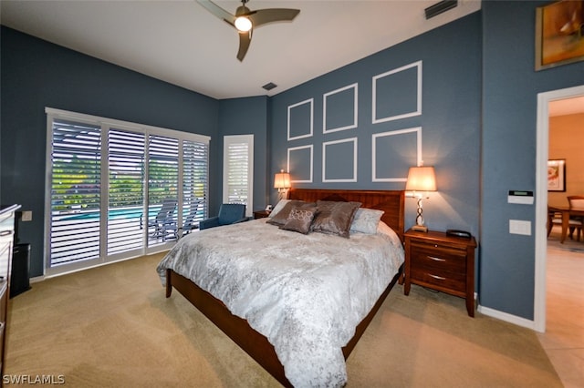 carpeted bedroom with access to exterior and ceiling fan