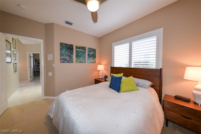 carpeted bedroom featuring ceiling fan