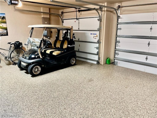 garage featuring a garage door opener