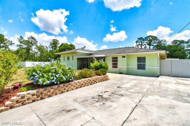 ranch-style house with a patio