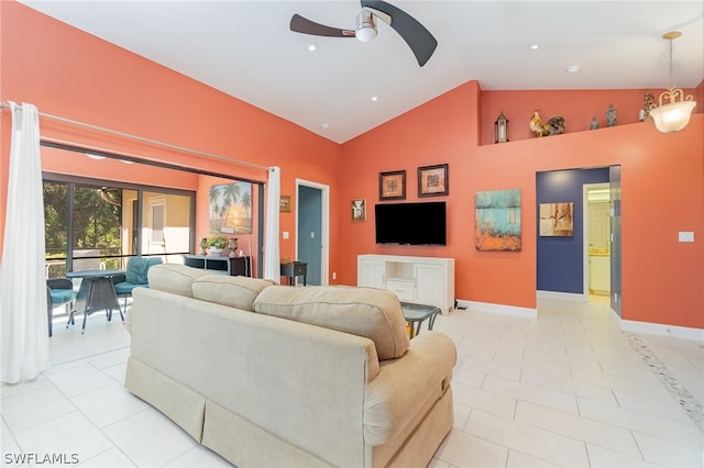 tiled living room featuring high vaulted ceiling and ceiling fan