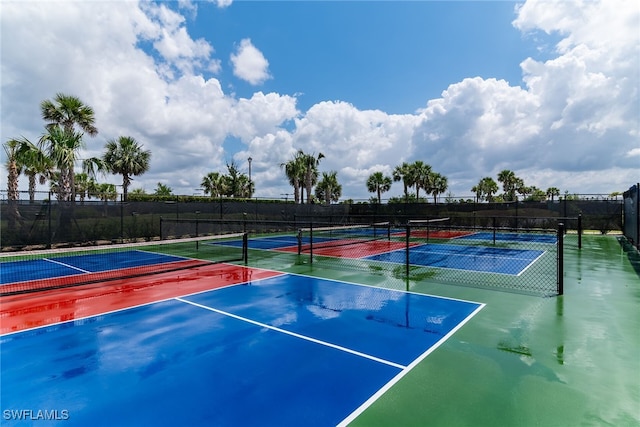 view of sport court featuring fence and community basketball court