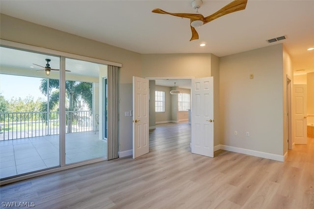 entryway featuring ceiling fan and light wood-type flooring