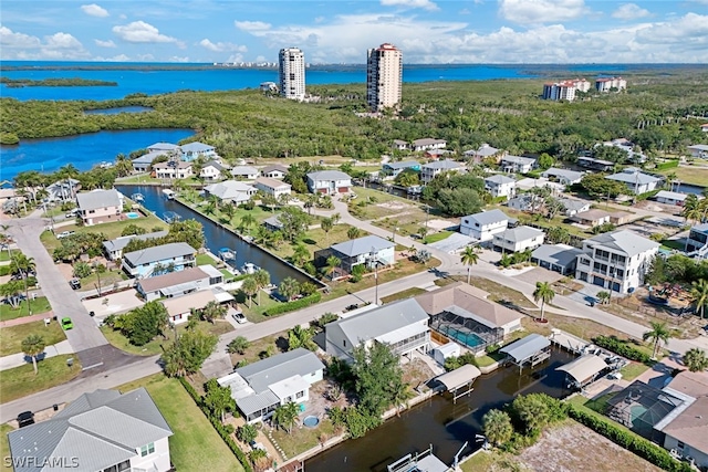 bird's eye view with a water view