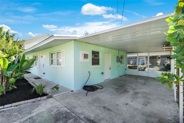 view of property exterior featuring a patio area