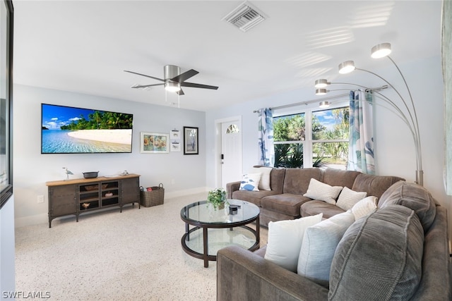 living room featuring ceiling fan