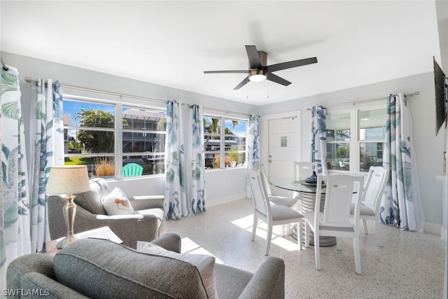 interior space featuring ceiling fan