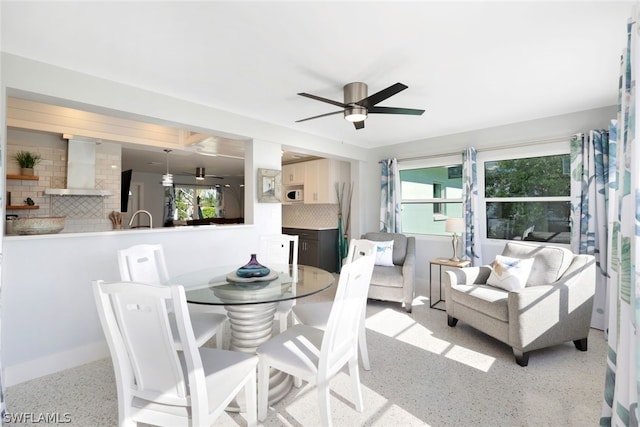 dining room with ceiling fan