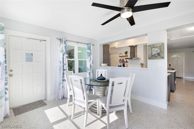 dining area with ceiling fan