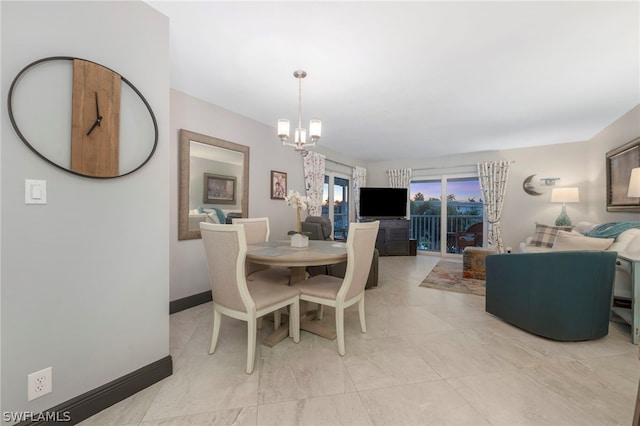 tiled dining room featuring a notable chandelier