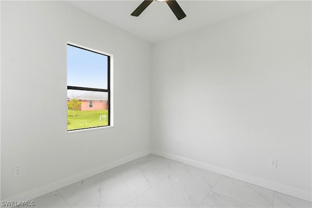 spare room featuring ceiling fan