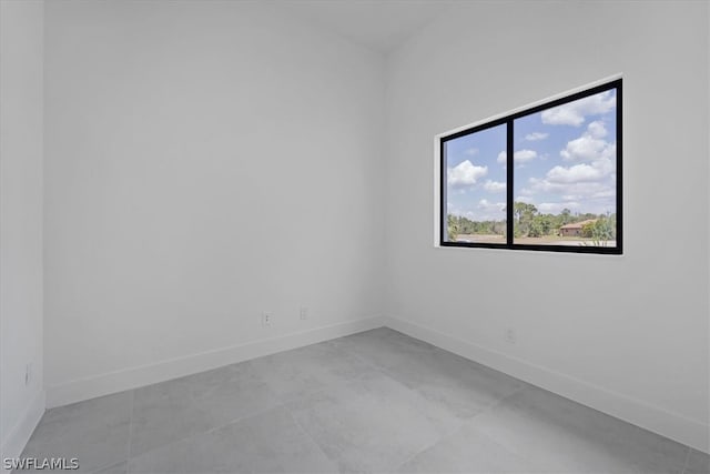 empty room with tile flooring