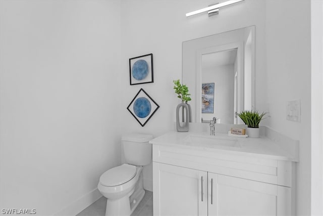 bathroom featuring toilet and oversized vanity