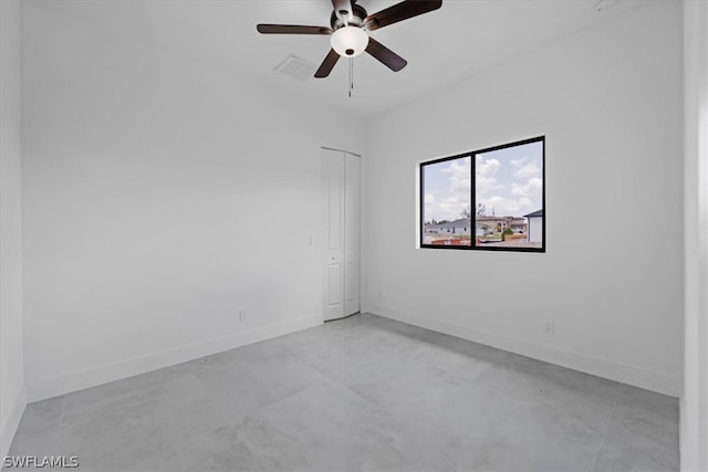 spare room with ceiling fan