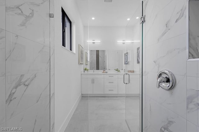 bathroom with tile flooring, vanity, and an enclosed shower