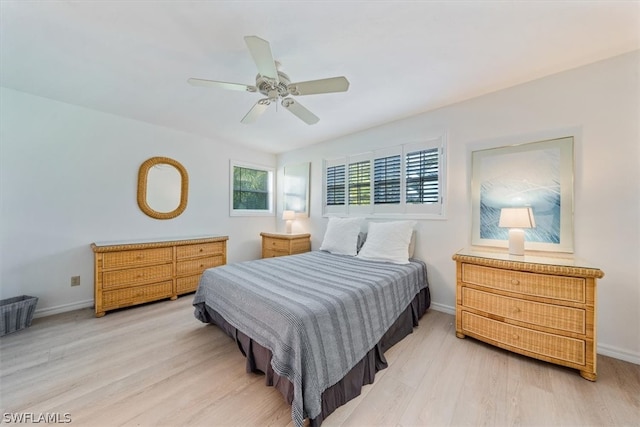 bedroom featuring hardwood / wood-style flooring and ceiling fan