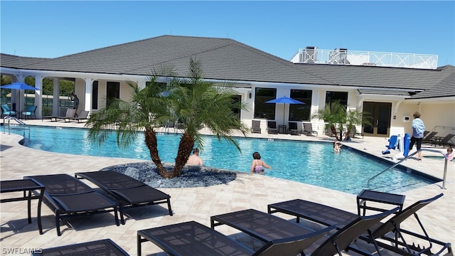 view of pool featuring a patio area