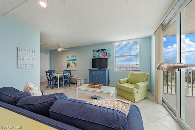 5600 Bonita Beach Rd SW Unit 4606, Bonita Springs, FL 34134 - living area featuring a textured ceiling and light tile patterned floors
