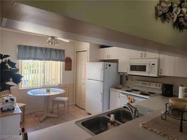 kitchen featuring white cabinets, white appliances, ceiling fan, and light tile floors