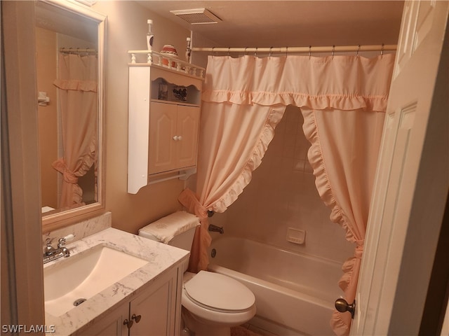 full bathroom featuring shower / bathtub combination with curtain, toilet, and vanity