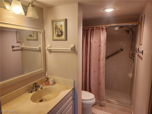 bathroom with a shower with shower curtain, vanity, tile floors, and toilet