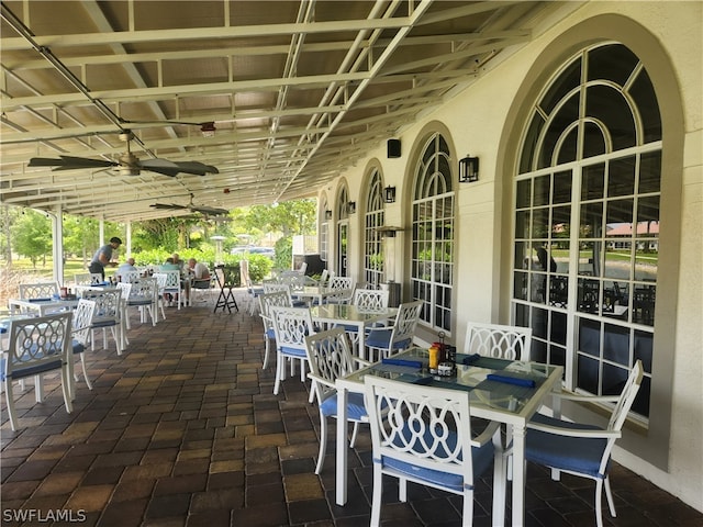 view of patio / terrace with french doors and ceiling fan