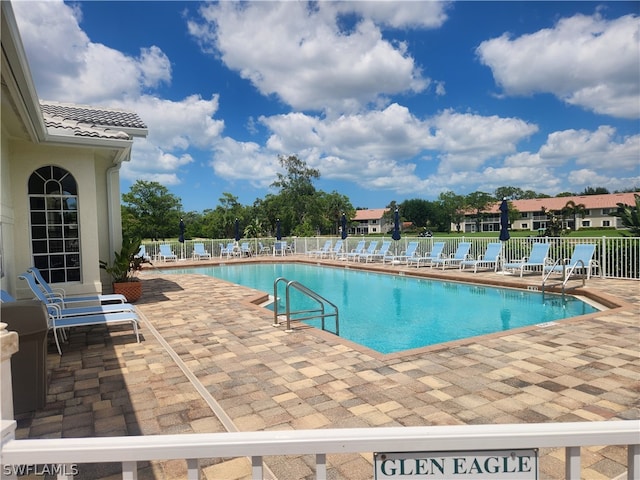 view of swimming pool featuring a patio