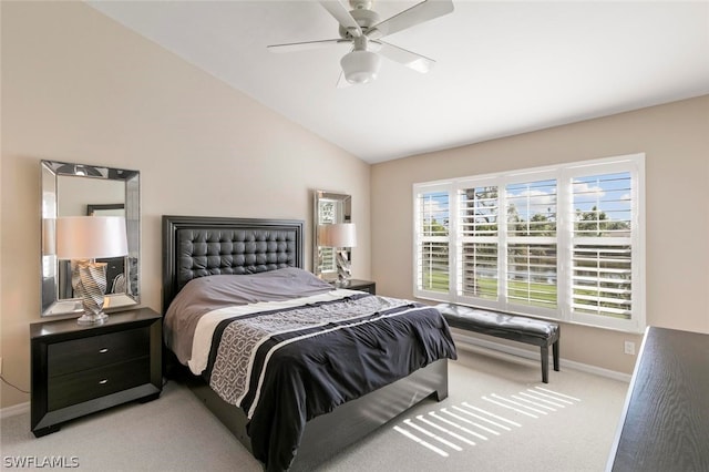 bedroom with light carpet, lofted ceiling, and ceiling fan