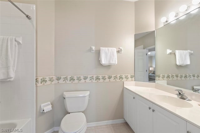 full bathroom featuring toilet, vanity, tile patterned flooring, and tiled shower / bath combo