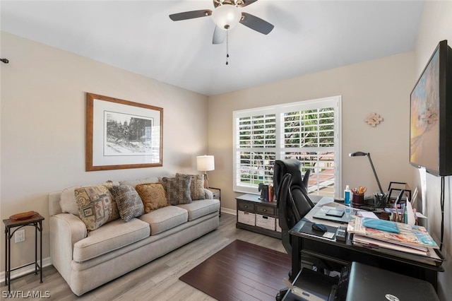 office area with ceiling fan and wood-type flooring