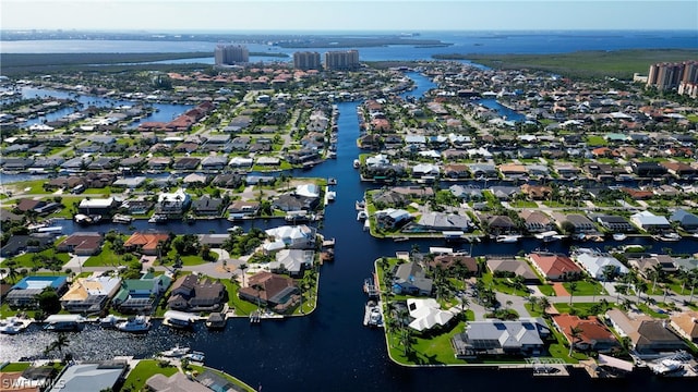 bird's eye view with a water view